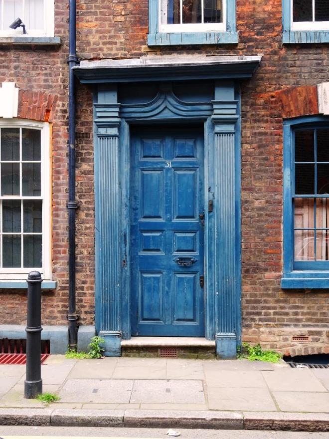 Door, eight panels and beautiful surround, Fournier Street, London, April 2019