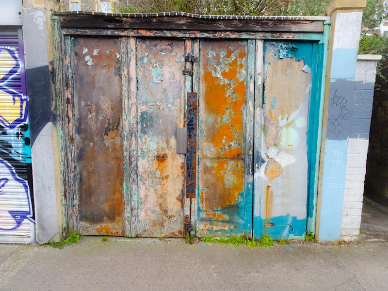 Worn and weathered garage door, Montpelier, Bristol, March 2020