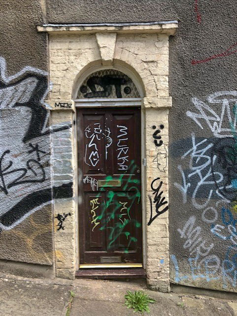 Graffiti door, Stokes Croft, Bristol, May 2021
