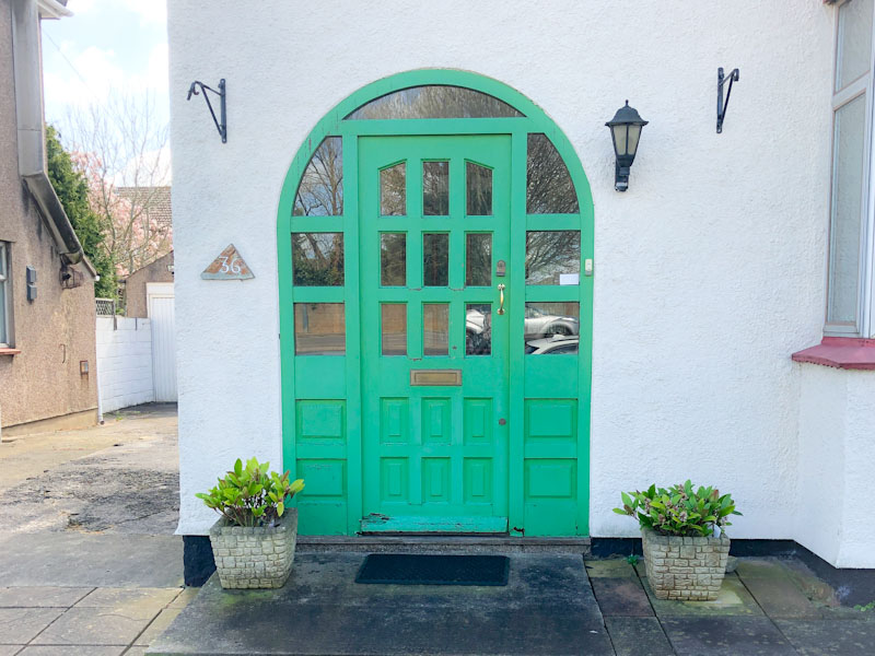 Green arched door, Filton, Bristol, March 2022