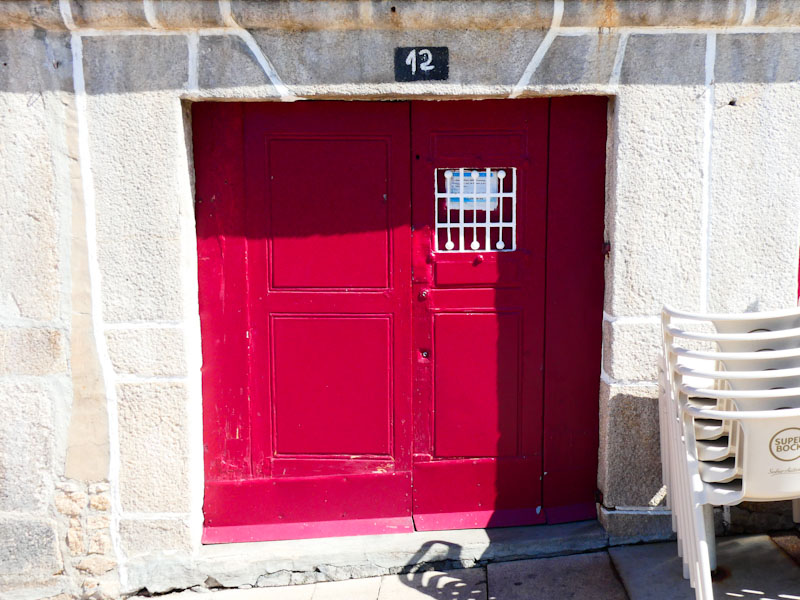 Red door on the waterfront, Porto, Portugal, June 2022