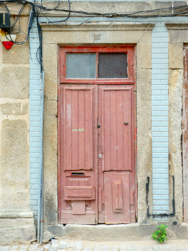Botched repair doors, Porto, Portugal, June 2022