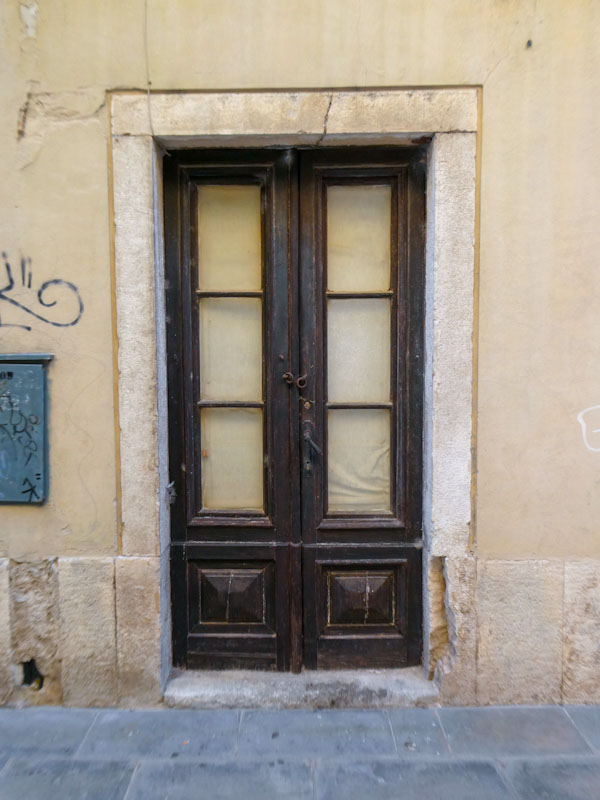 Glass panelled doors, Pula, Croatia, August 2023